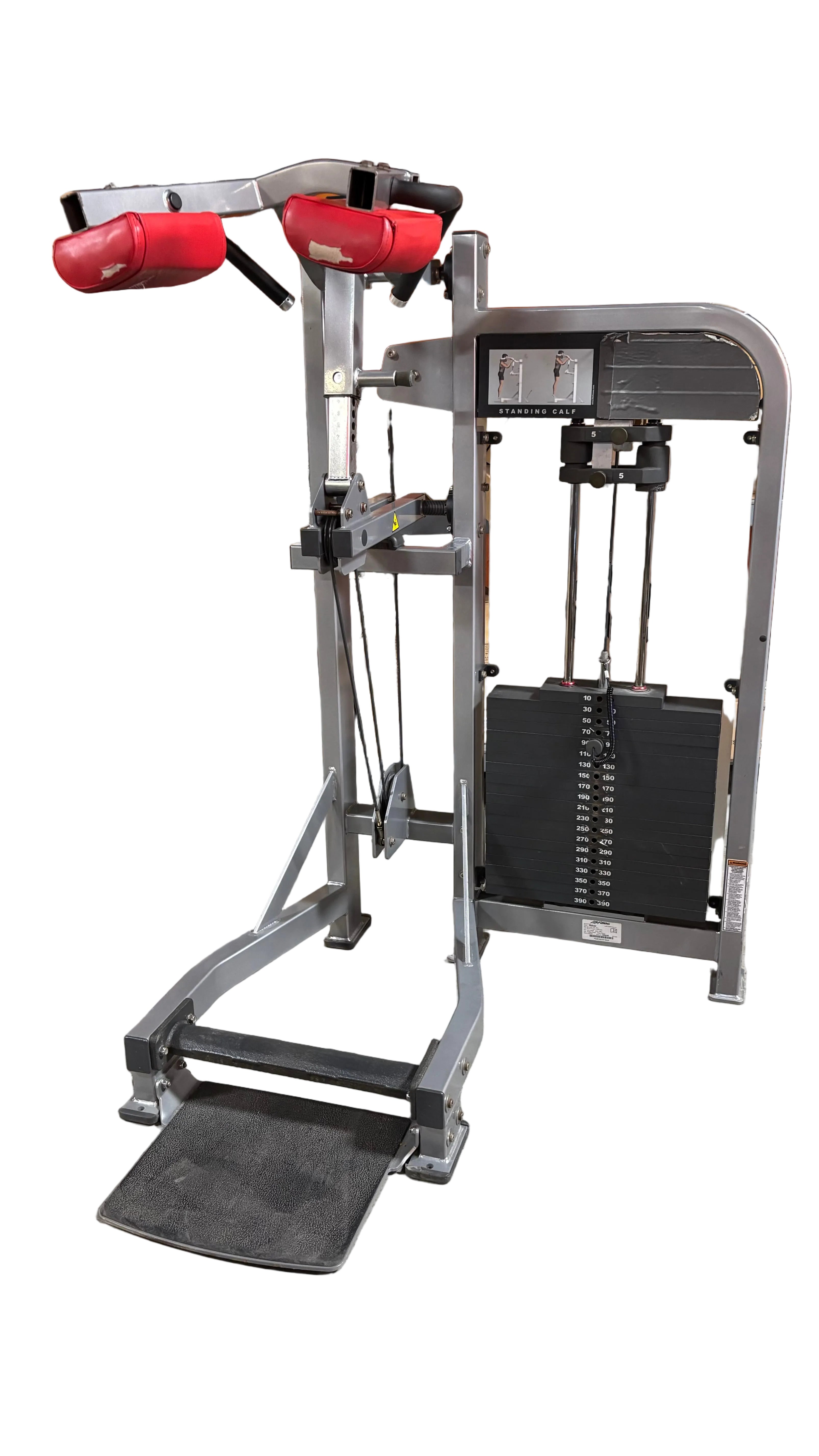 Used Life Fitness standing calf raise