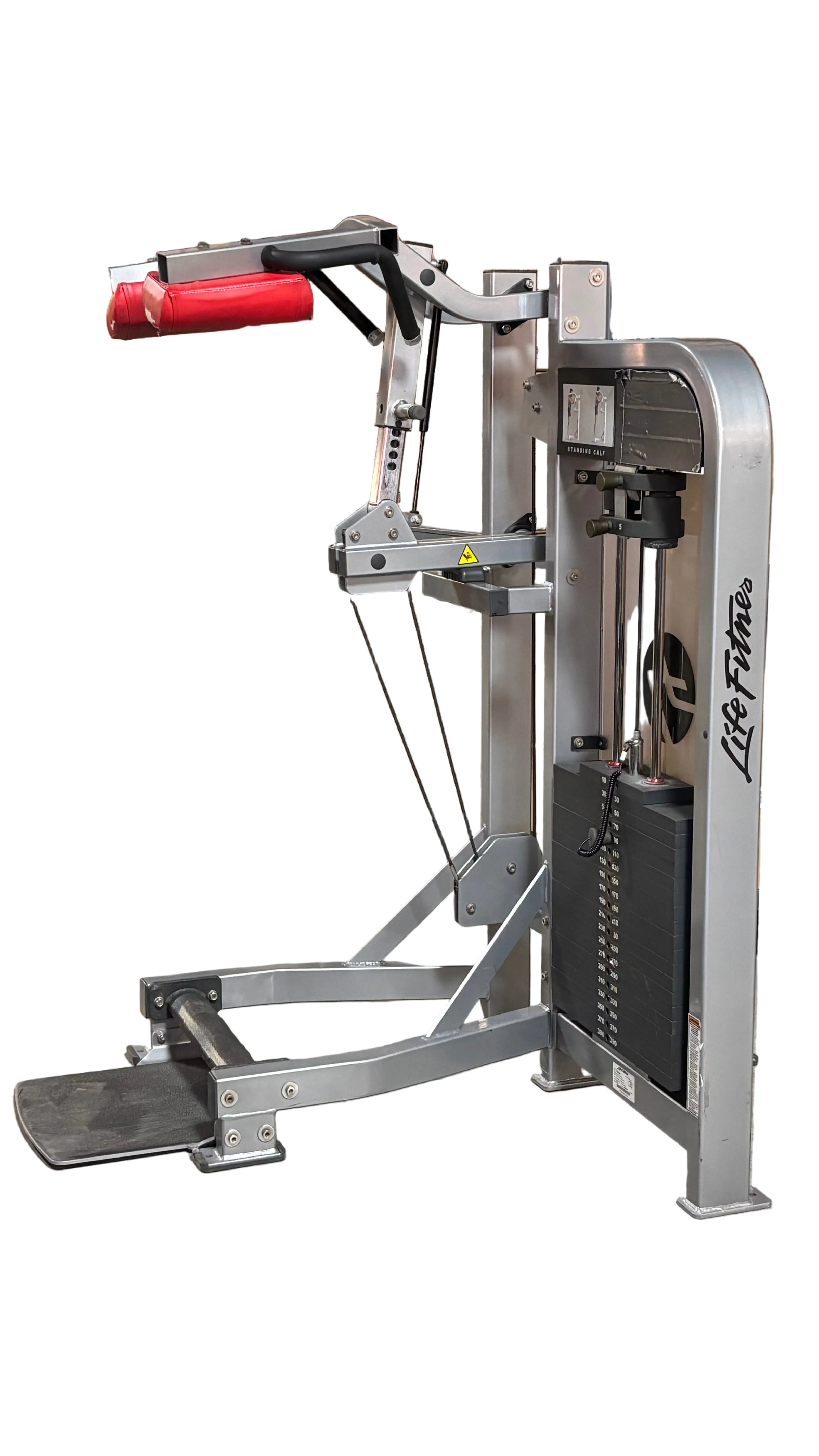 Used Life Fitness standing calf raise